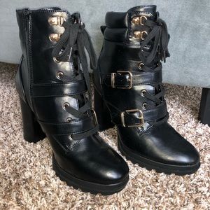 Black heeled combat boots